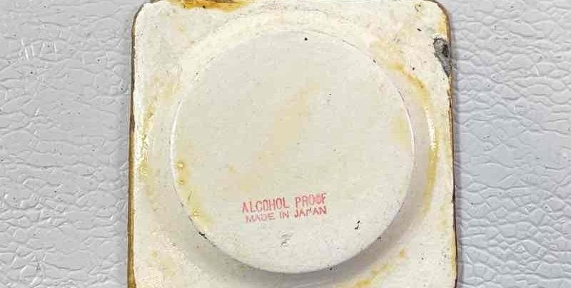(SOLD) Eight Vintage Black Floral Coasters Made in Japan