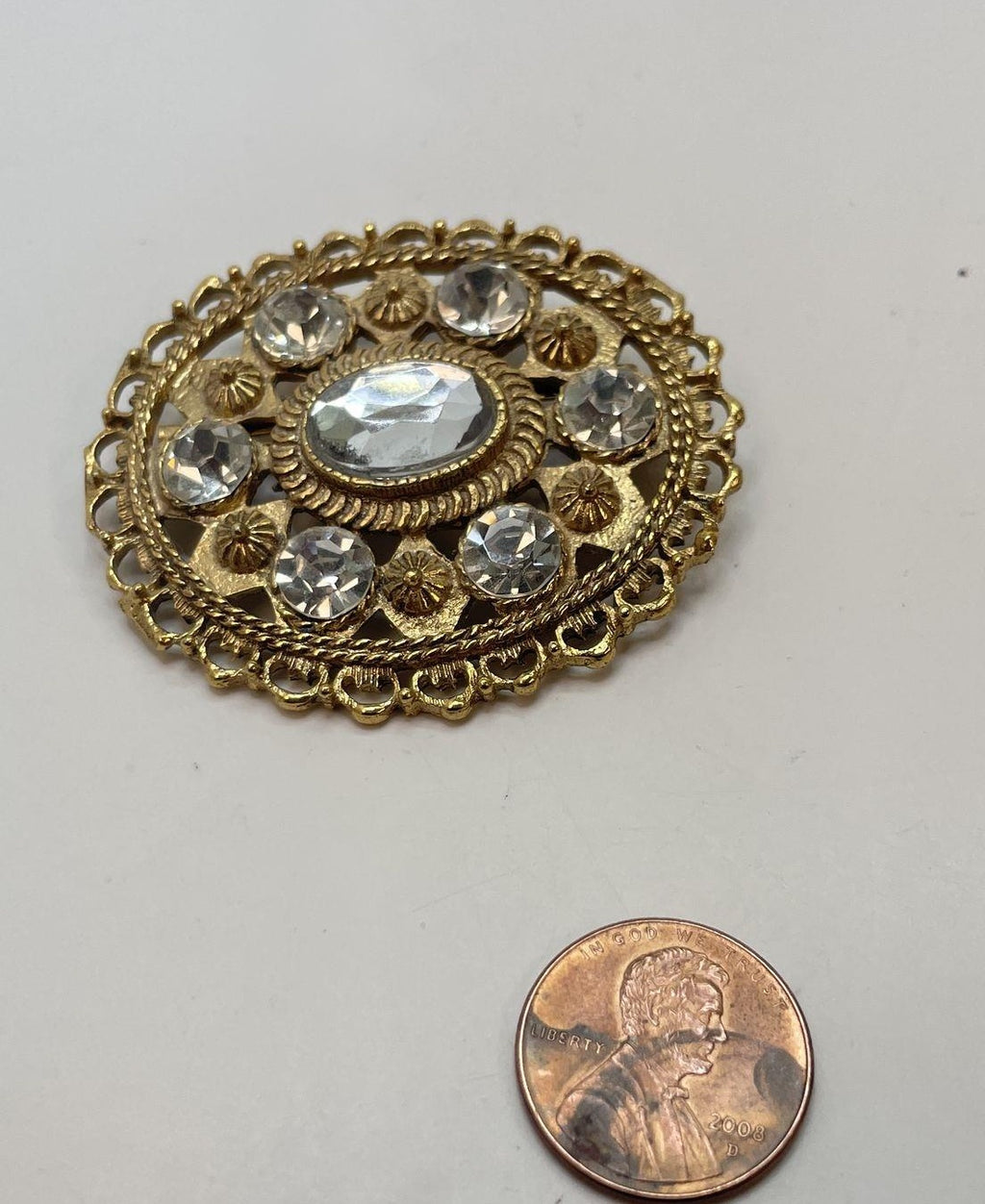 Vintage Gold Tone Domed Rhinestone Brooch Oval Filigree Statement Pin
