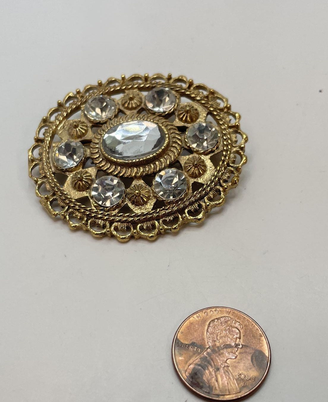 Vintage Gold Tone Domed Rhinestone Brooch Oval Filigree Statement Pin
