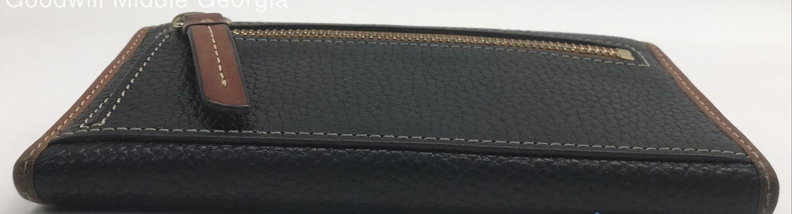 Dooney and Bourke Pebble Grain Clutch Wallet Black Leather with Brown Trim