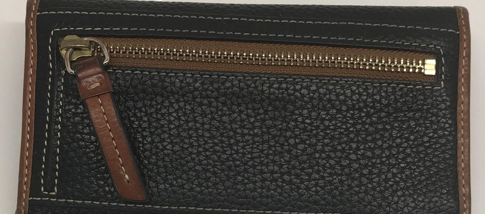 Dooney and Bourke Pebble Grain Clutch Wallet Black Leather with Brown Trim