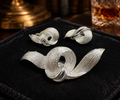 Lisner Silver Tone Swirl Brooch and Earring Set Textured Ribbon Knot Design