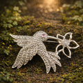 Vintage Silver Tone Hummingbird Brooch with Rhinestone Flower Accent