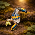 Gold tone enamel toucan brooch colorful tropical bird on branch pin