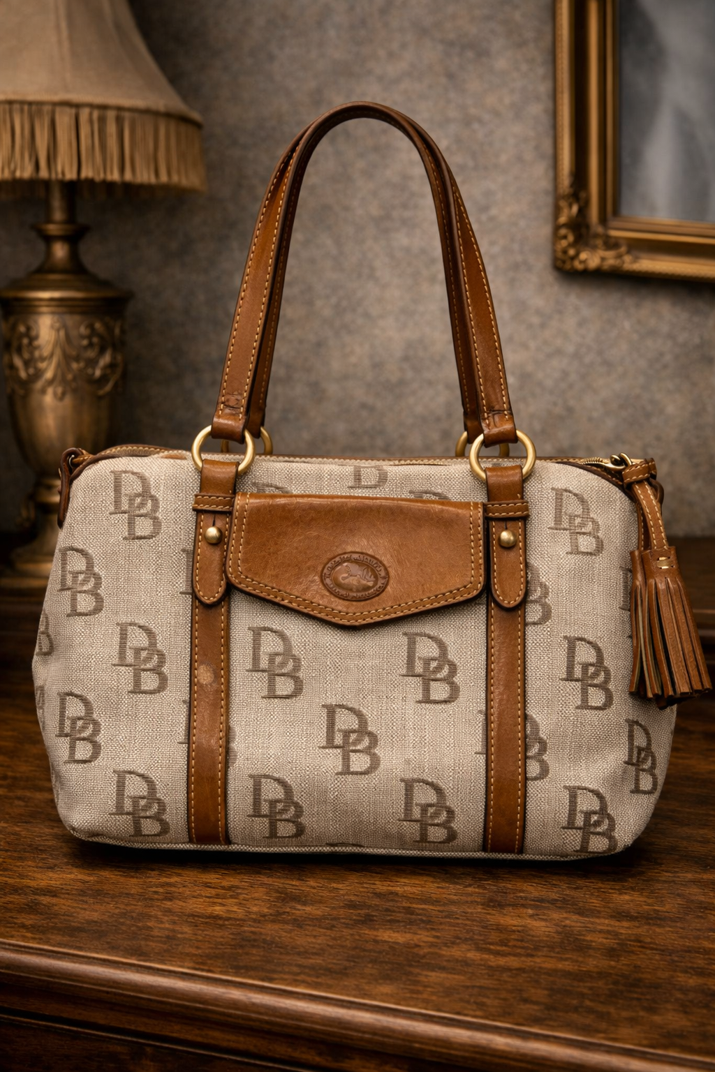 Dooney & Bourke DB Monogram Canvas Satchel Bag Leather Trim Tassel Barrel Shoulder Purse