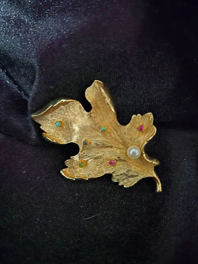 Capri Gold Tone Leaf Brooch with Multicolor Gemstones and Faux Pearl Accent