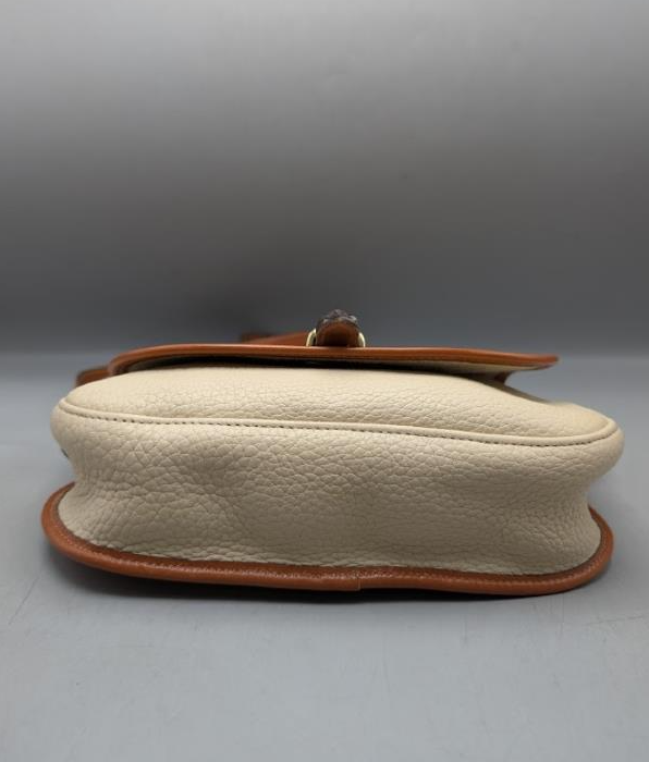 Vintage Dooney & Bourke Equestrian Tack Crossbody Bag | Cream Pebbled Leather Saddle Bag