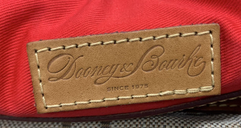 Dooney & Bourke DB Monogram Canvas Satchel Bag Leather Trim Tassel Barrel Shoulder Purse
