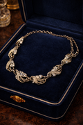 Vintage Gold-Tone Rhinestone Statement Necklace with Leaf Scroll Links | Elegant Mid-Century Style