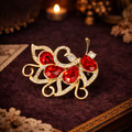 Gold Tone Filigree Butterfly Brooch Red Rhinestone Wings Pave Crystal Accents Pin