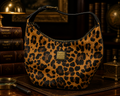 Dooney and Bourke Animal Print Coated Cotton Hobo Bag with Leather Trim