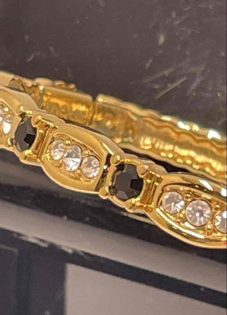 Swarovski Gold-Tone Hinged Bangle Bracelet with Clear and Jet Crystal Accents
