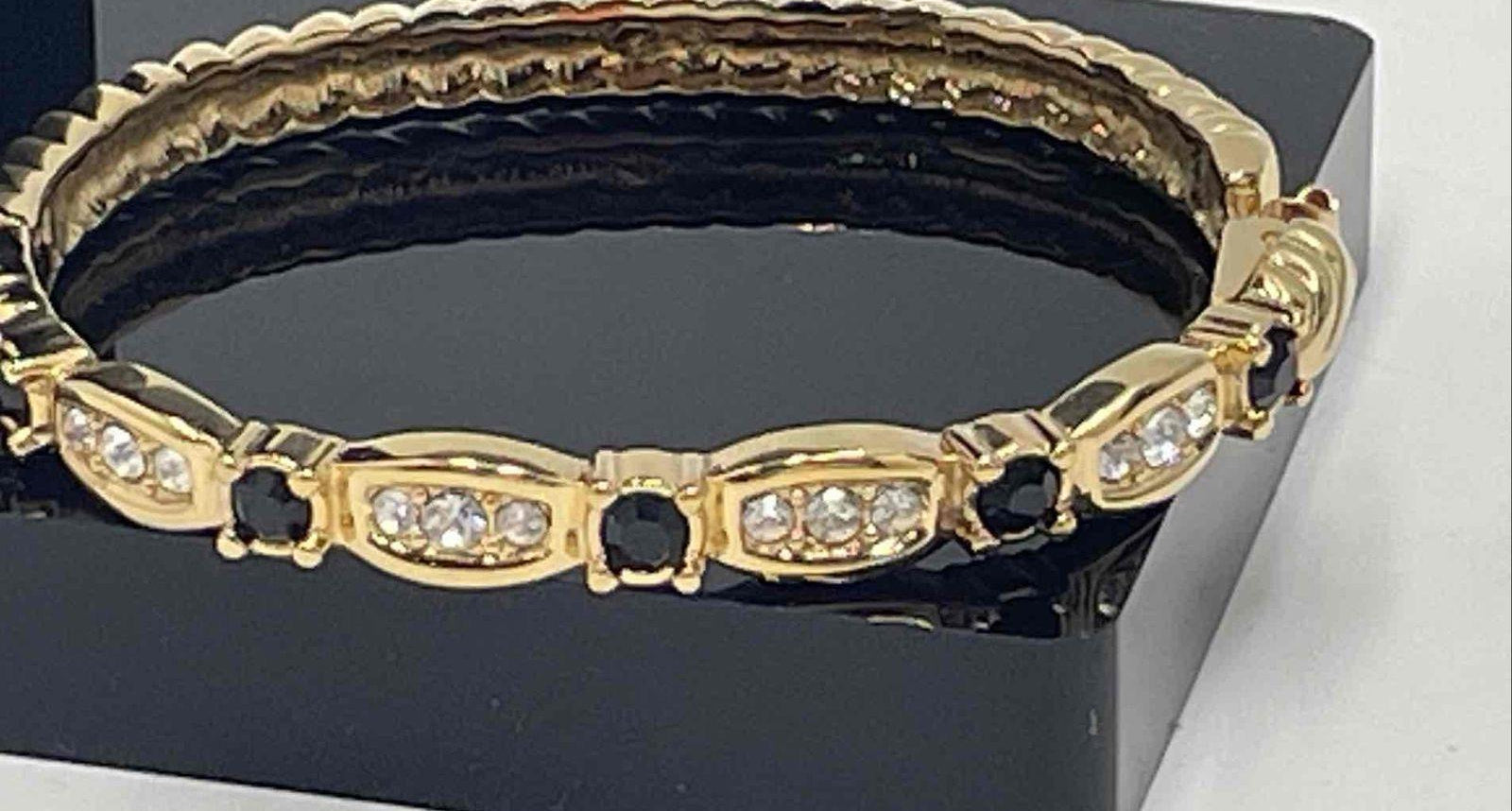 Swarovski Gold-Tone Hinged Bangle Bracelet with Clear and Jet Crystal Accents