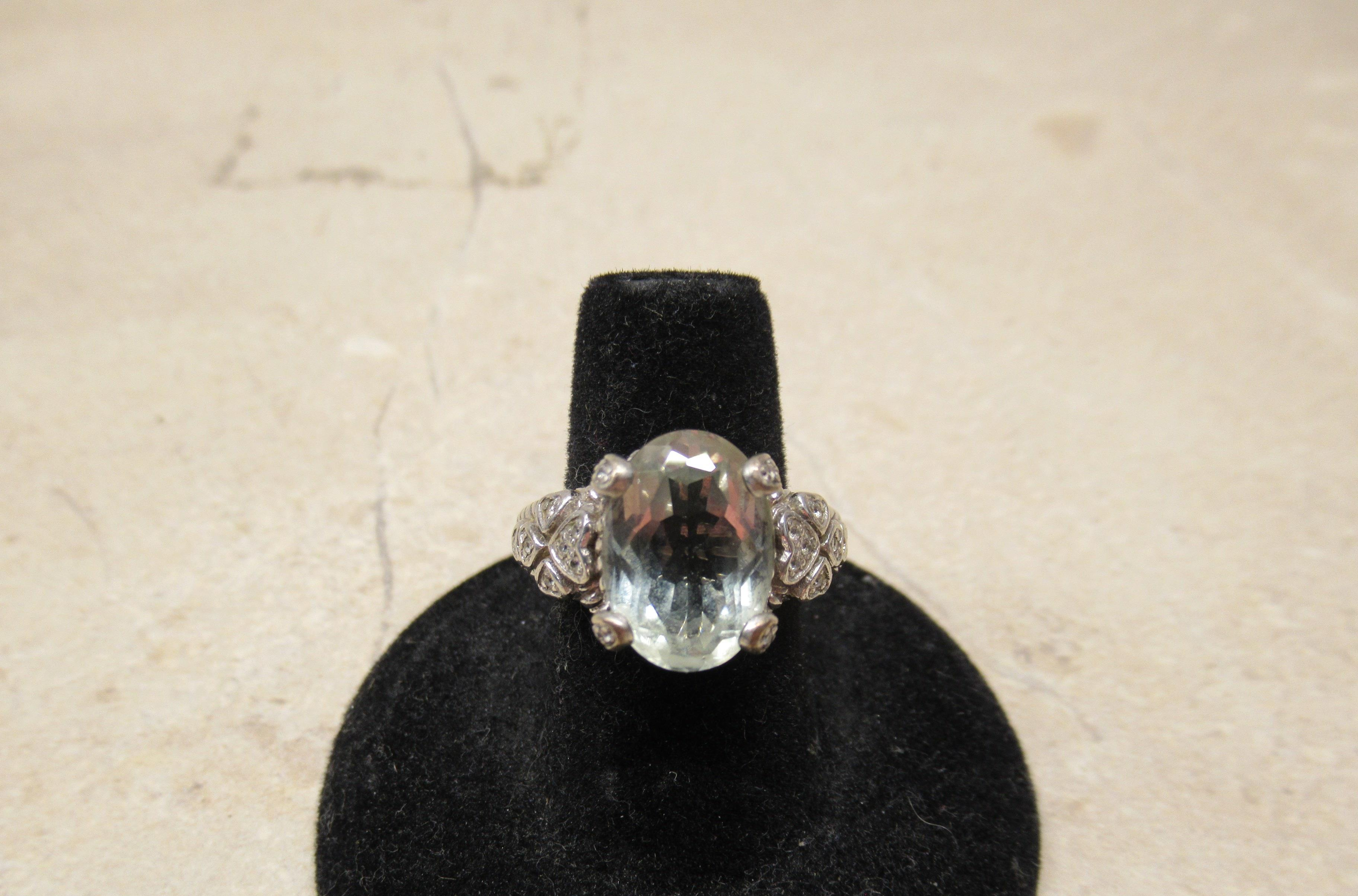 Judith Ripka 925 silver & lt. green CZ stone ring size 7
