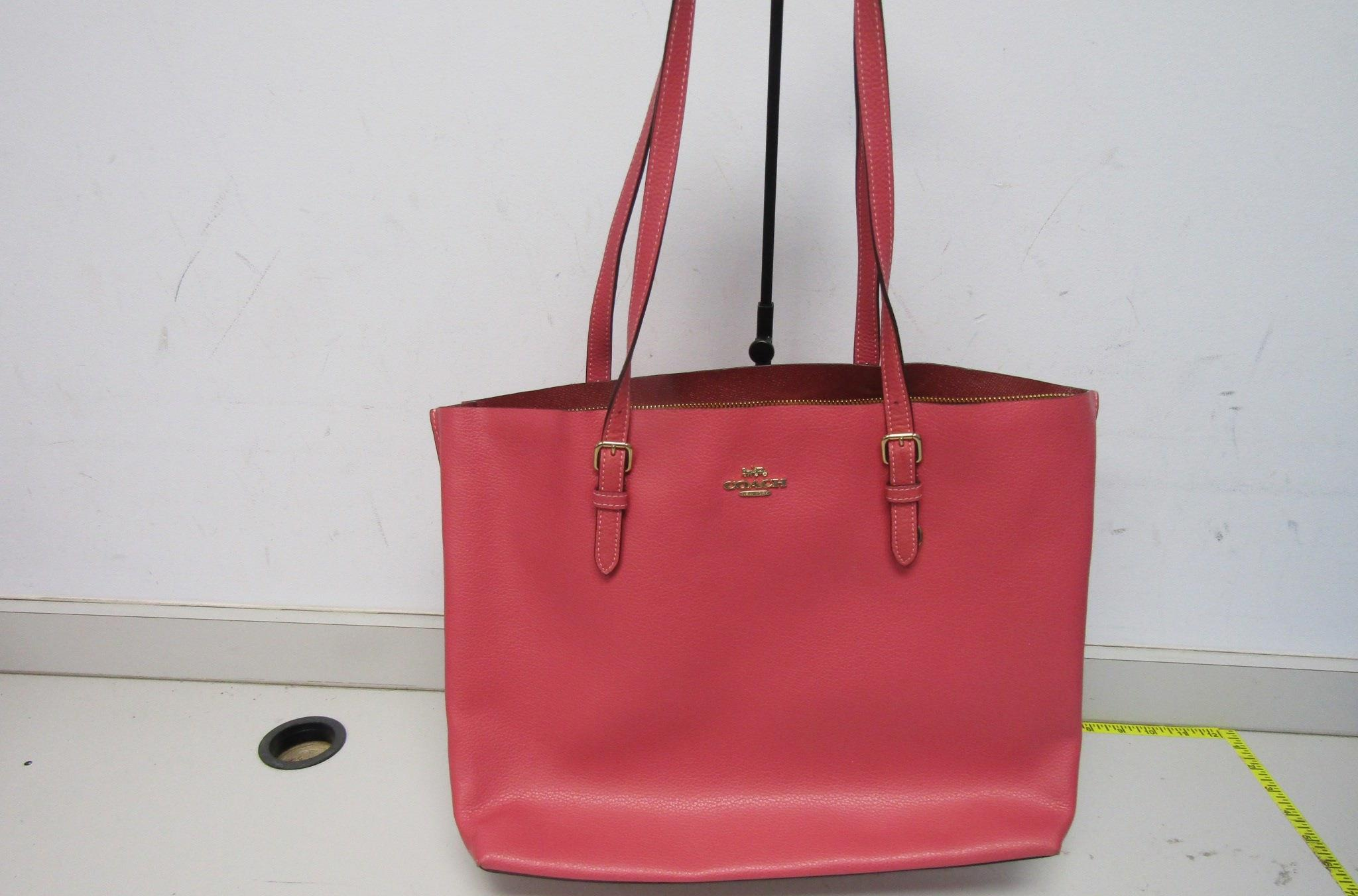 Authenticated Coach salmon pebbled leather Mollie tote bag. Zipper is Broken