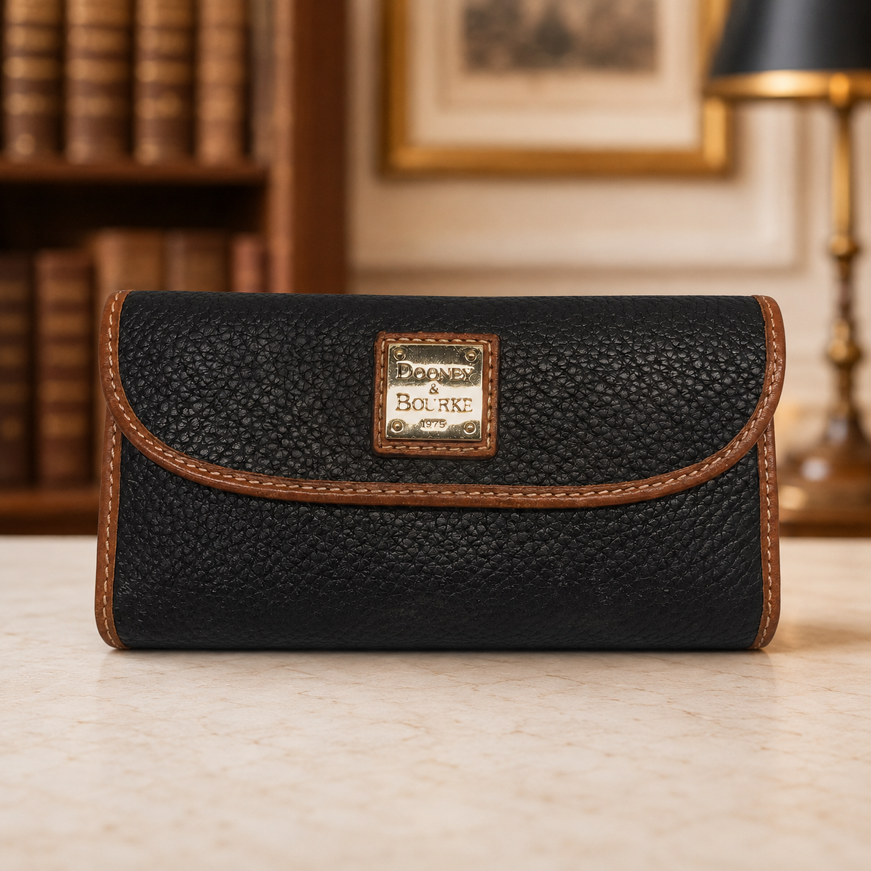 Dooney and Bourke Pebble Grain Clutch Wallet Black Leather with Brown Trim