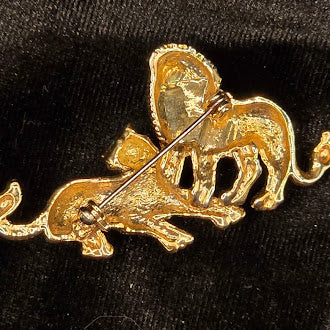 Gold Tone Lion And Lioness Brooch With Rhinestone Accents And Green Eyes