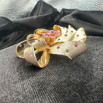 Gold Tone Pink Crystal Pinwheel Brooch Textured Ribbon Swirl Design