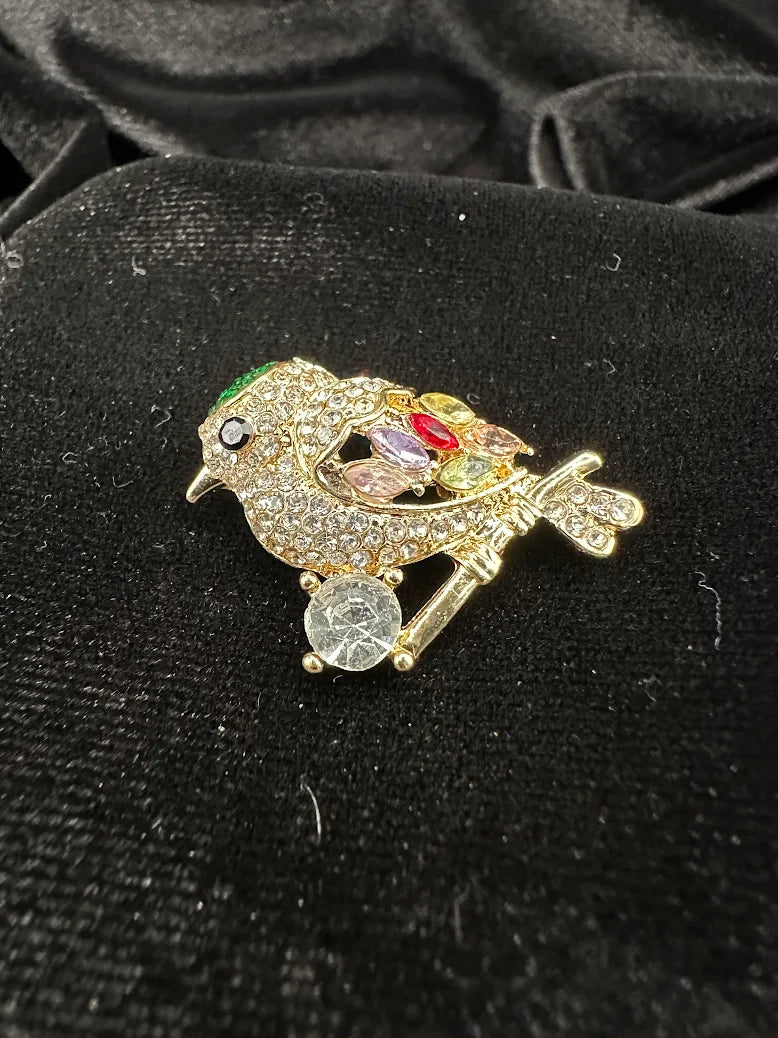 Vintage Gold Tone Rhinestone Perched Bird Brooch with Multicolor Crystals