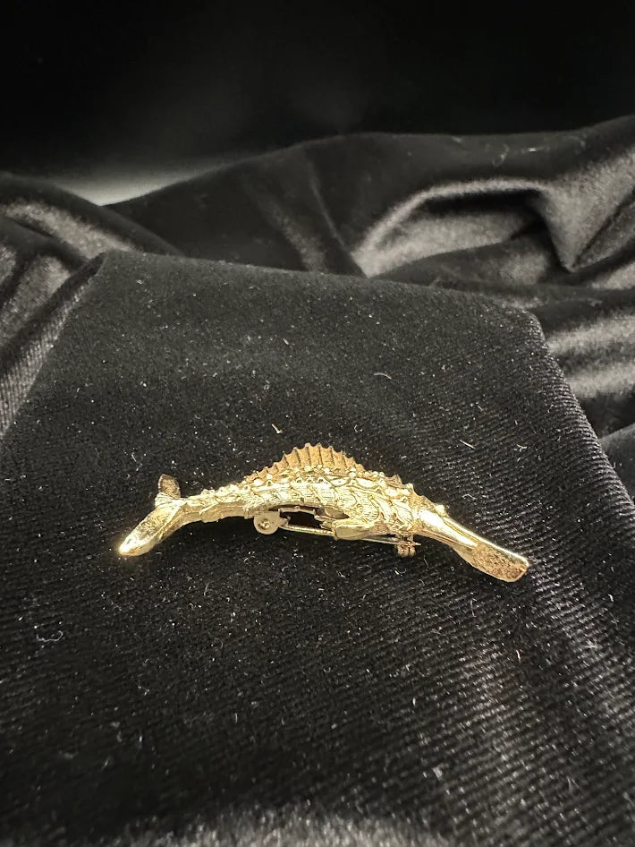 Gold tone marlin brooch with textured fin detail