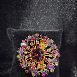 Vintage Austria Signed Gold Tone Rhinestone Brooch with Pink and Lavender Baguette Stones