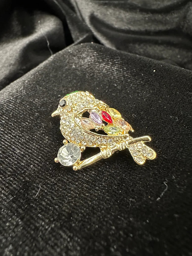 Vintage Gold Tone Rhinestone Perched Bird Brooch with Multicolor Crystals
