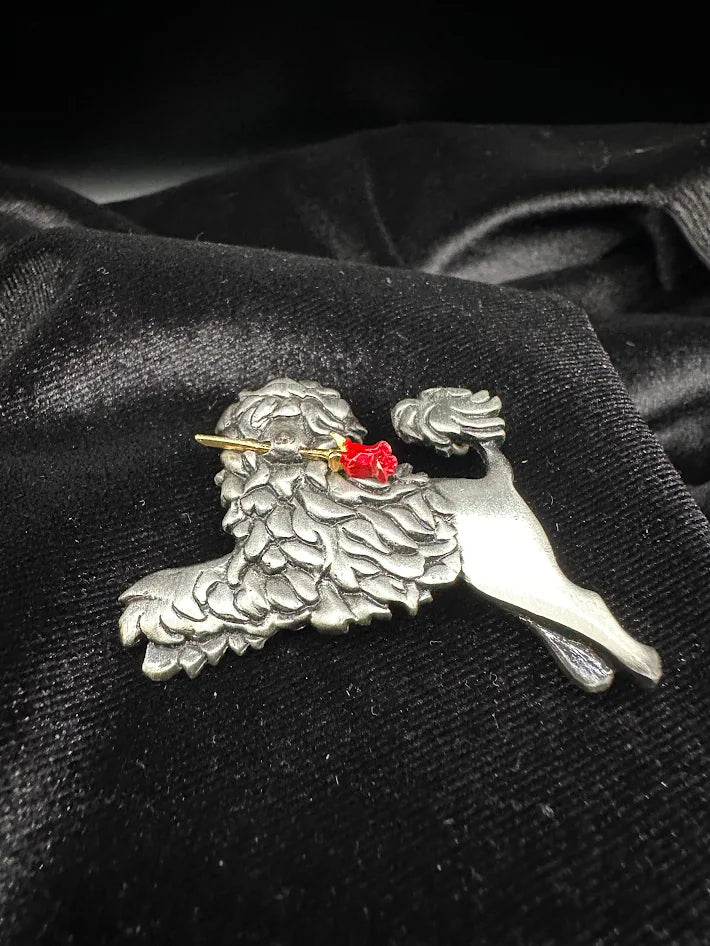 (SOLD) M. Shields pewter poodle brooch with red flower accent