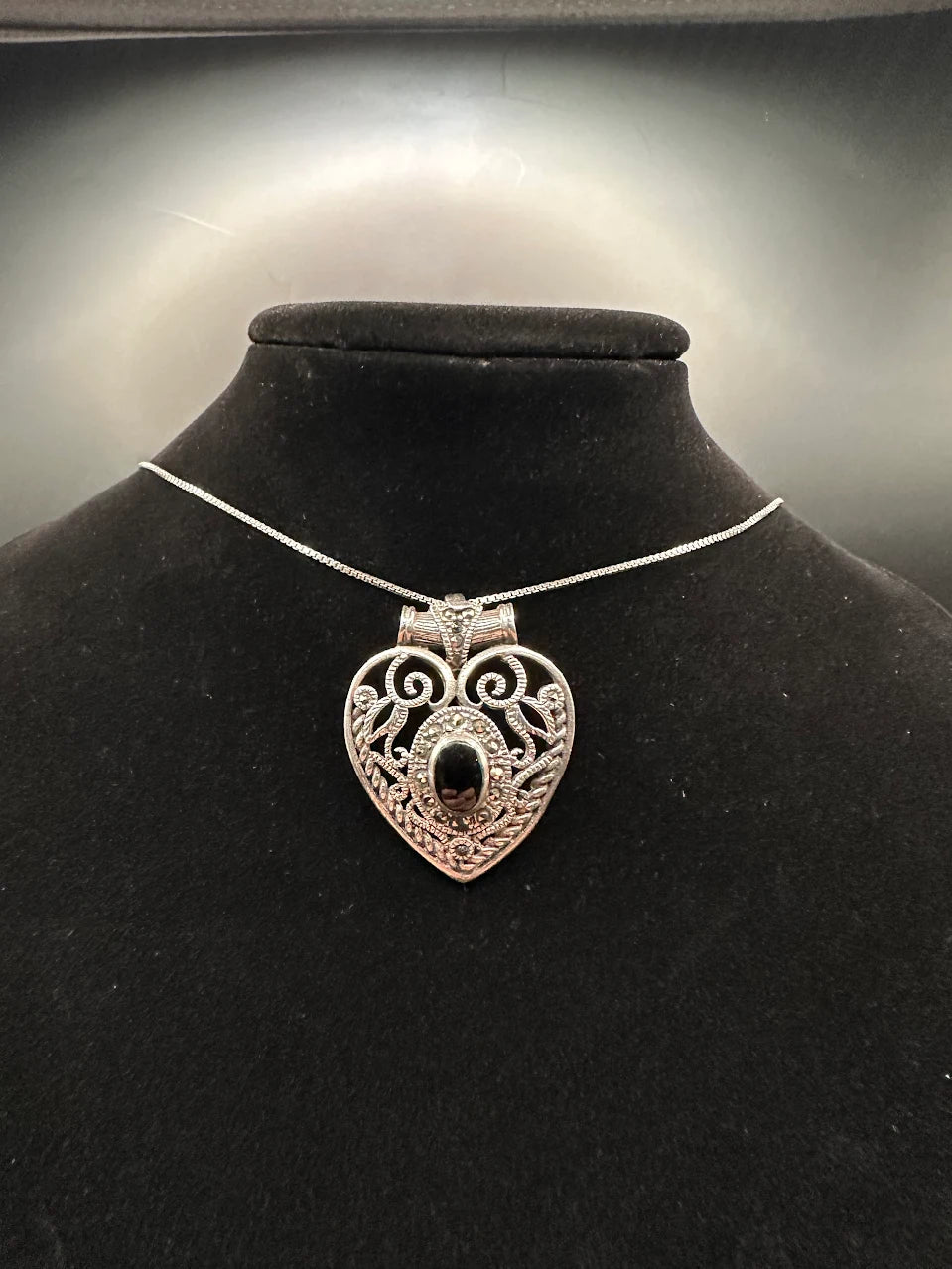 Silver tone black stone heart pendant necklace openwork scroll design