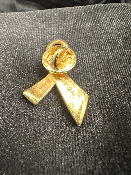 Avon Gold Tone Pink Crystal Ribbon Brooch with Textured Awareness Ribbon Design