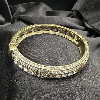 Heidi Daus Crystal Bangle Bracelet Gold Tone Hinged Cuff Clear Rhinestone Statement Designer