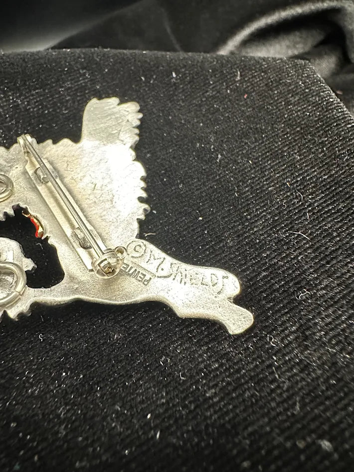 (SOLD) M. Shields pewter poodle brooch with red flower accent