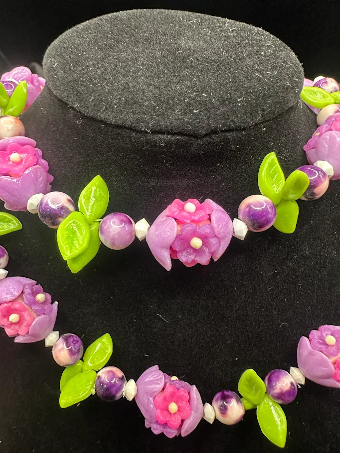 Pink and Purple Flower Bead Necklace with Green Leaf Accents  Description
