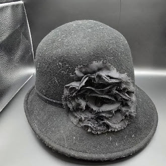 Black felt cloche hat with layered flower accent