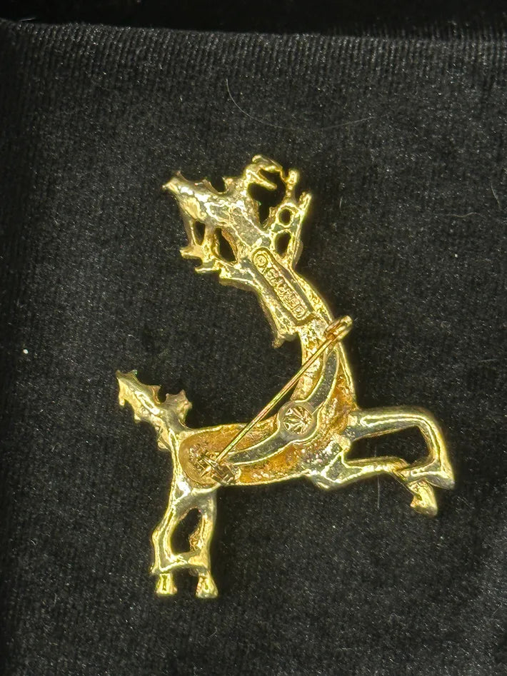 Vintage Christmas Gold Tone Reindeer Brooch with Green Enamel Holly and Red Rhinestone Accent