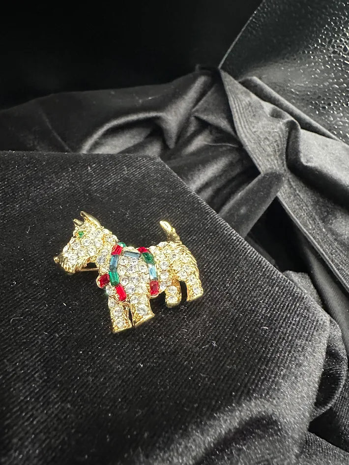 Signed Gold tone terrier brooch with clear red green and blue crystals