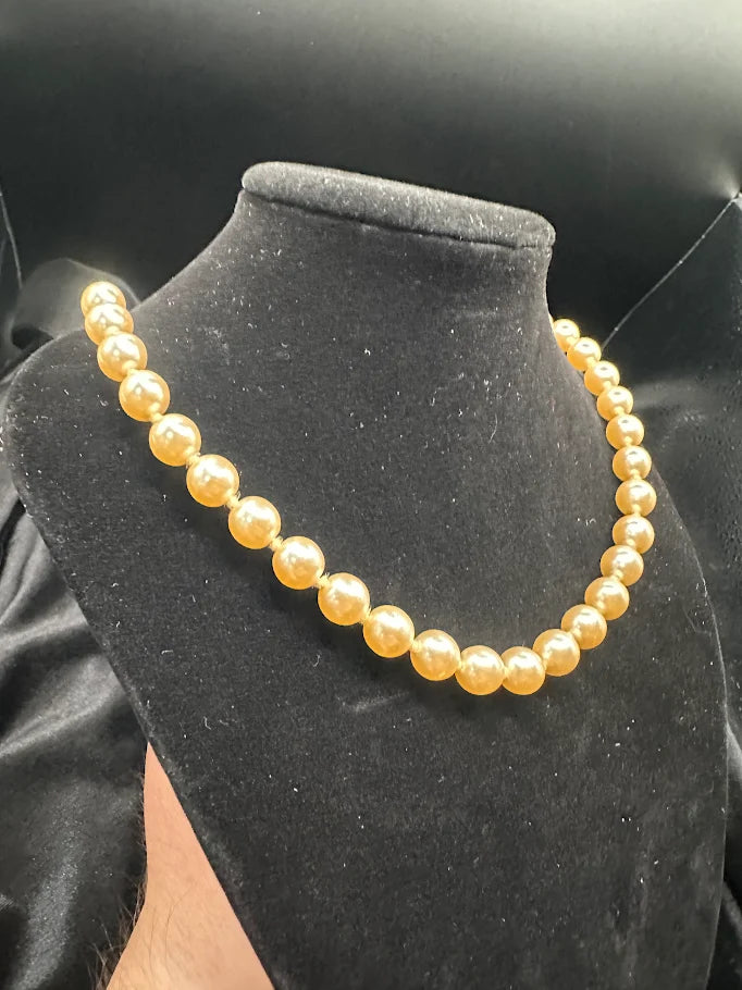 Gold Tone Cream Pearl Style Necklace with Decorative Clasp