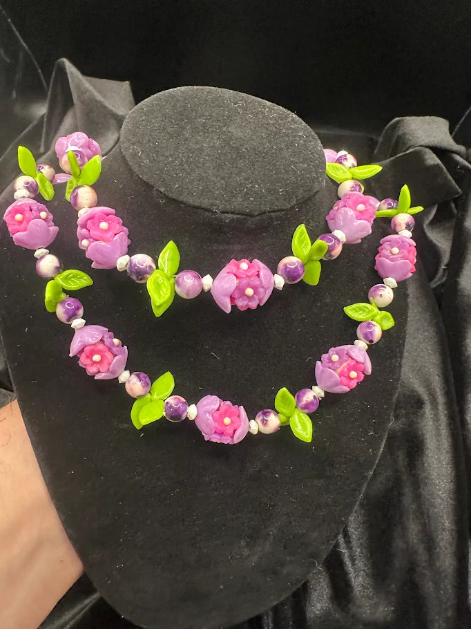Pink and Purple Flower Bead Necklace with Green Leaf Accents  Description