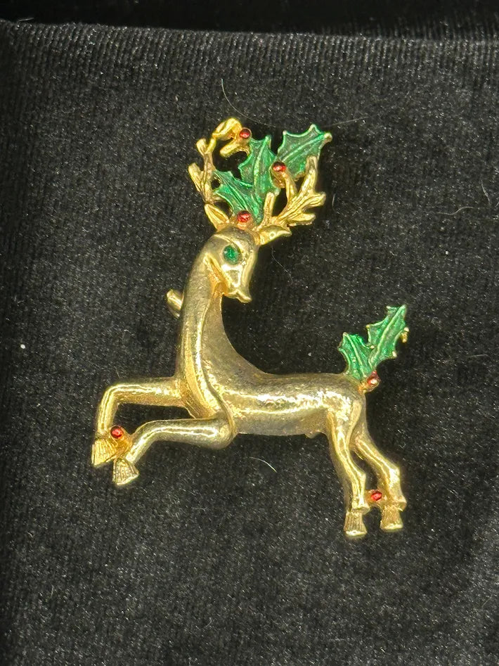 Vintage Christmas Gold Tone Reindeer Brooch with Green Enamel Holly and Red Rhinestone Accent