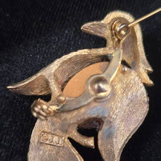 JJ gold tone jelly belly bird brooch with red lucite belly