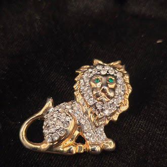 Gold Tone Rhinestone Lion Brooch With Clear Crystals And Green Eyes