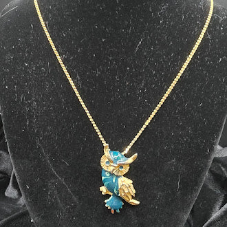 Gold tone owl pendant necklace with blue enamel detail