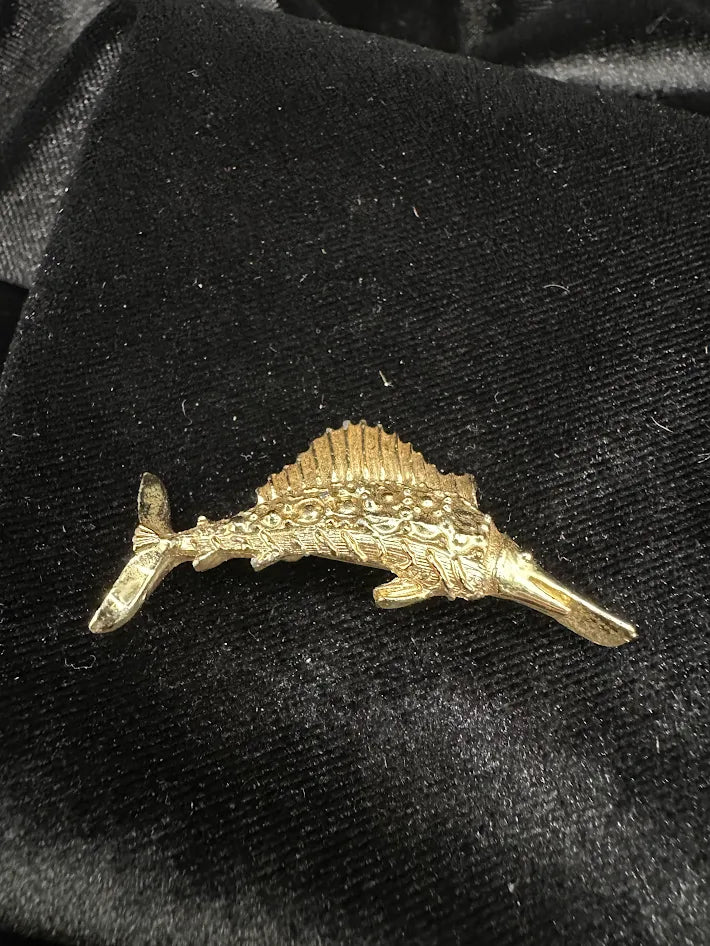 Gold tone marlin brooch with textured fin detail