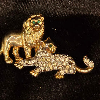 Gold Tone Lion And Lioness Brooch With Rhinestone Accents And Green Eyes
