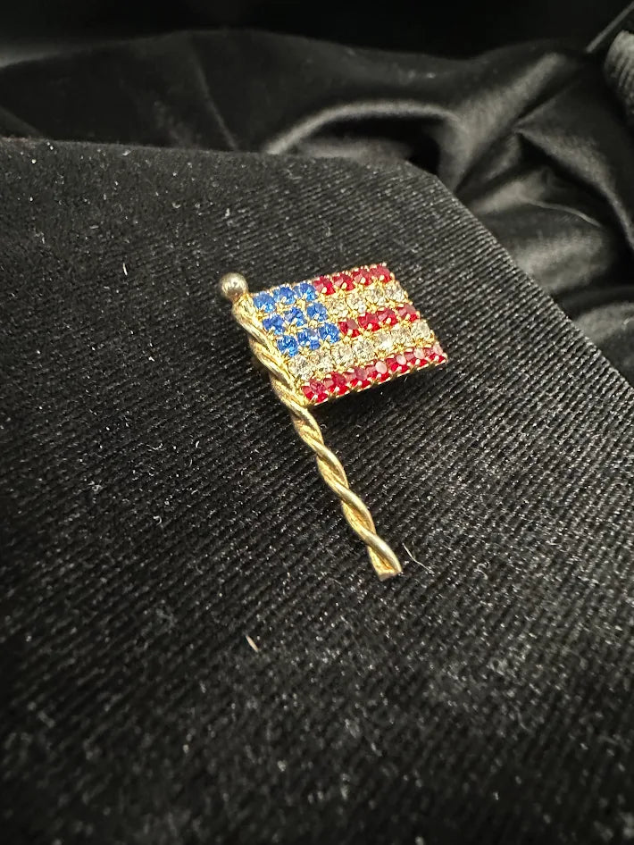 Eisenberg Ice gold tone American flag brooch with red white and blue crystals