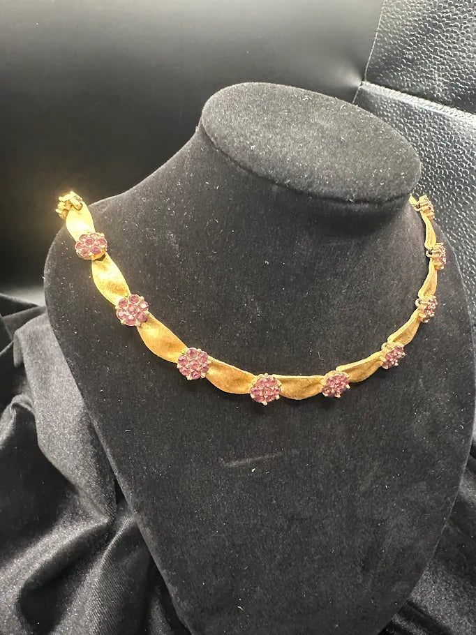 (SOLD) Trifari Gold Tone Ribbon Necklace with Ruby Red Stone Accents