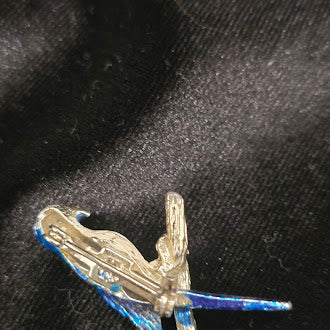 Blue enamel parrot brooch on branch with gold tone trim