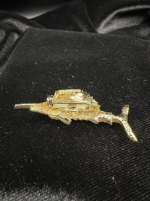 Gold tone marlin brooch with textured fin detail