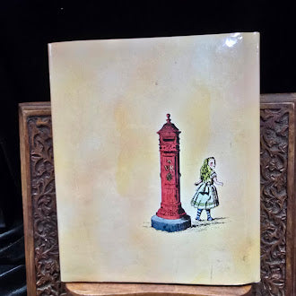 Alice Through the Pillar Box and What She Found There by Gerald King 1978 Whizzard Press Hardcover with Dust Jacket Illustrated