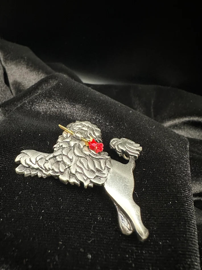 (SOLD) M. Shields pewter poodle brooch with red flower accent