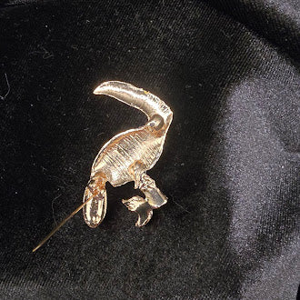 Gold tone enamel toucan brooch colorful tropical bird on branch pin